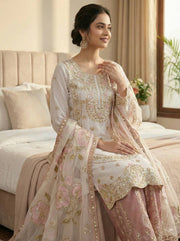 Vibrant Elegance in Traditional Pakistani Attire