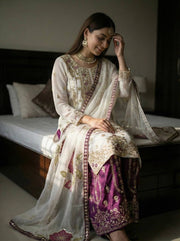 Vibrant Elegance in Traditional Pakistani Attire