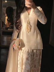 Luxury Pearl White Designer Suit Featuring Intricate Golden Embroidery Details