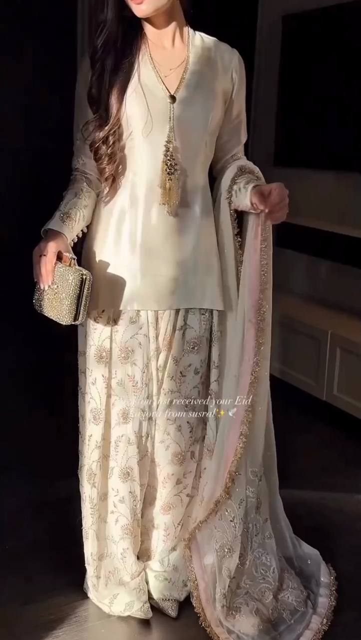 Luxury Pearl White Designer Suit Featuring Intricate Golden Embroidery Details