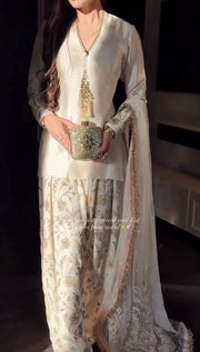 Luxury Pearl White Designer Suit Featuring Intricate Golden Embroidery Details
