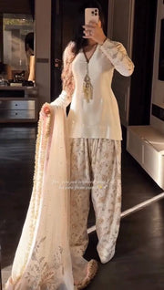 Luxury Pearl White Designer Suit Featuring Intricate Golden Embroidery Details
