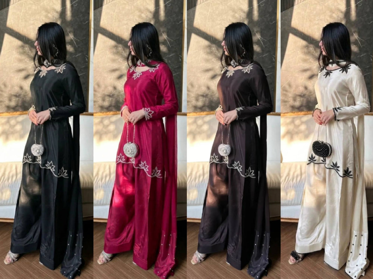 Elegant ivory salwar suit with black embroidery