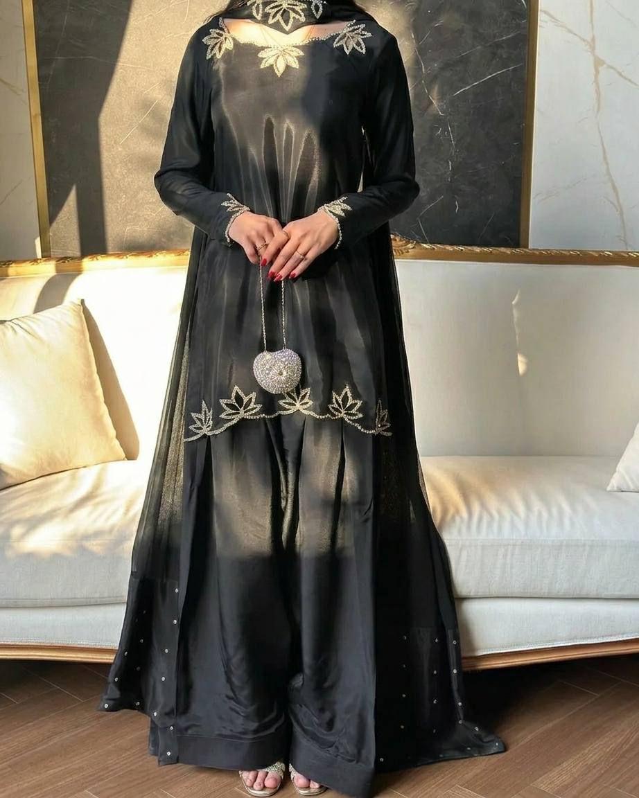 Elegant ivory salwar suit with black embroidery