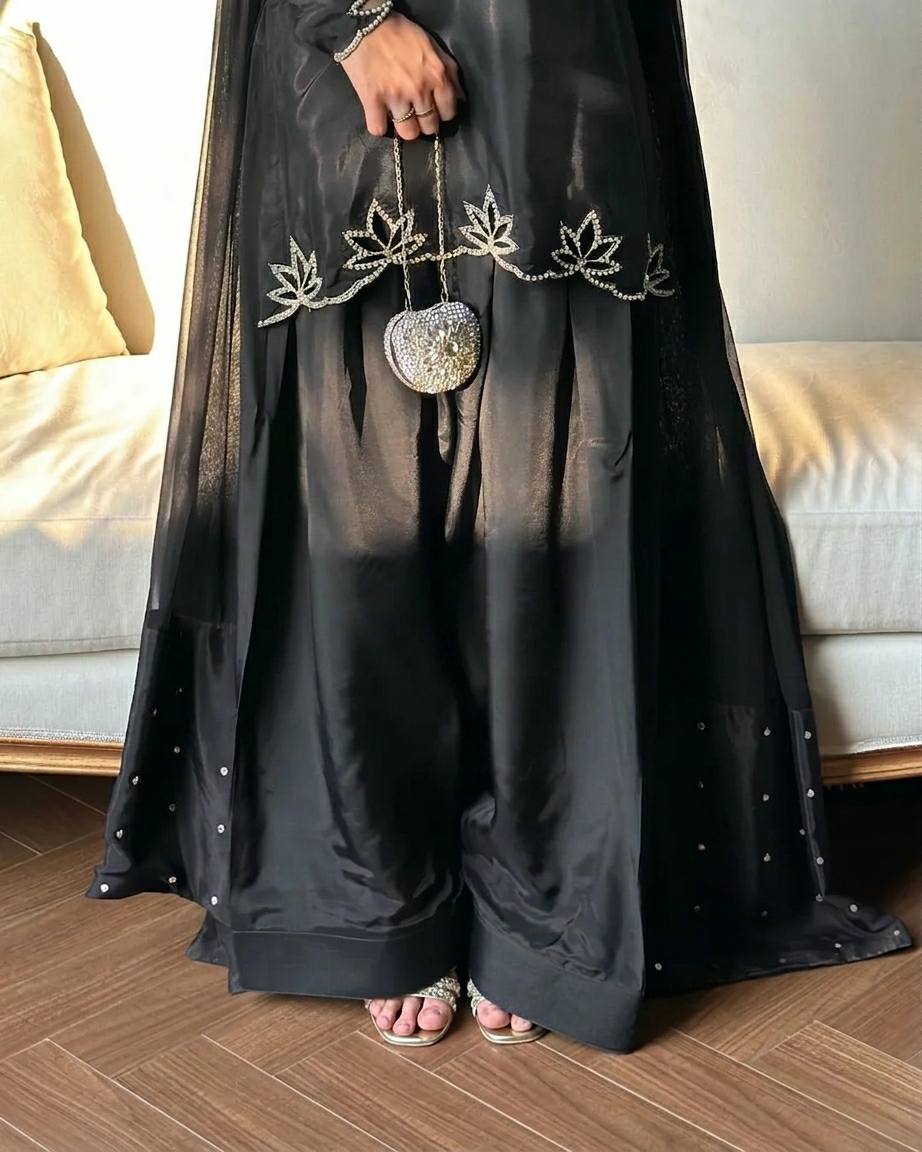 Elegant ivory salwar suit with black embroidery