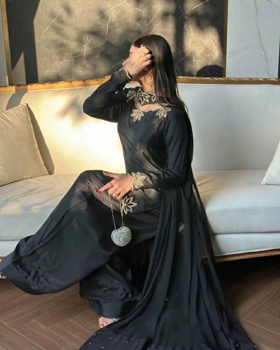 Elegant ivory salwar suit with black embroidery