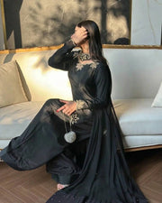 Elegant ivory salwar suit with black embroidery