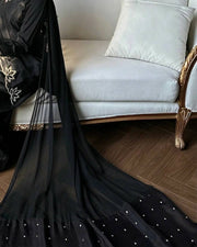 Elegant ivory salwar suit with black embroidery