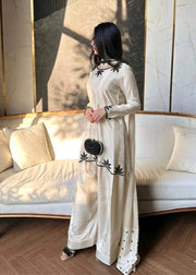Elegant ivory salwar suit with black embroidery