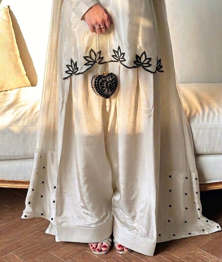 Elegant ivory salwar suit with black embroidery