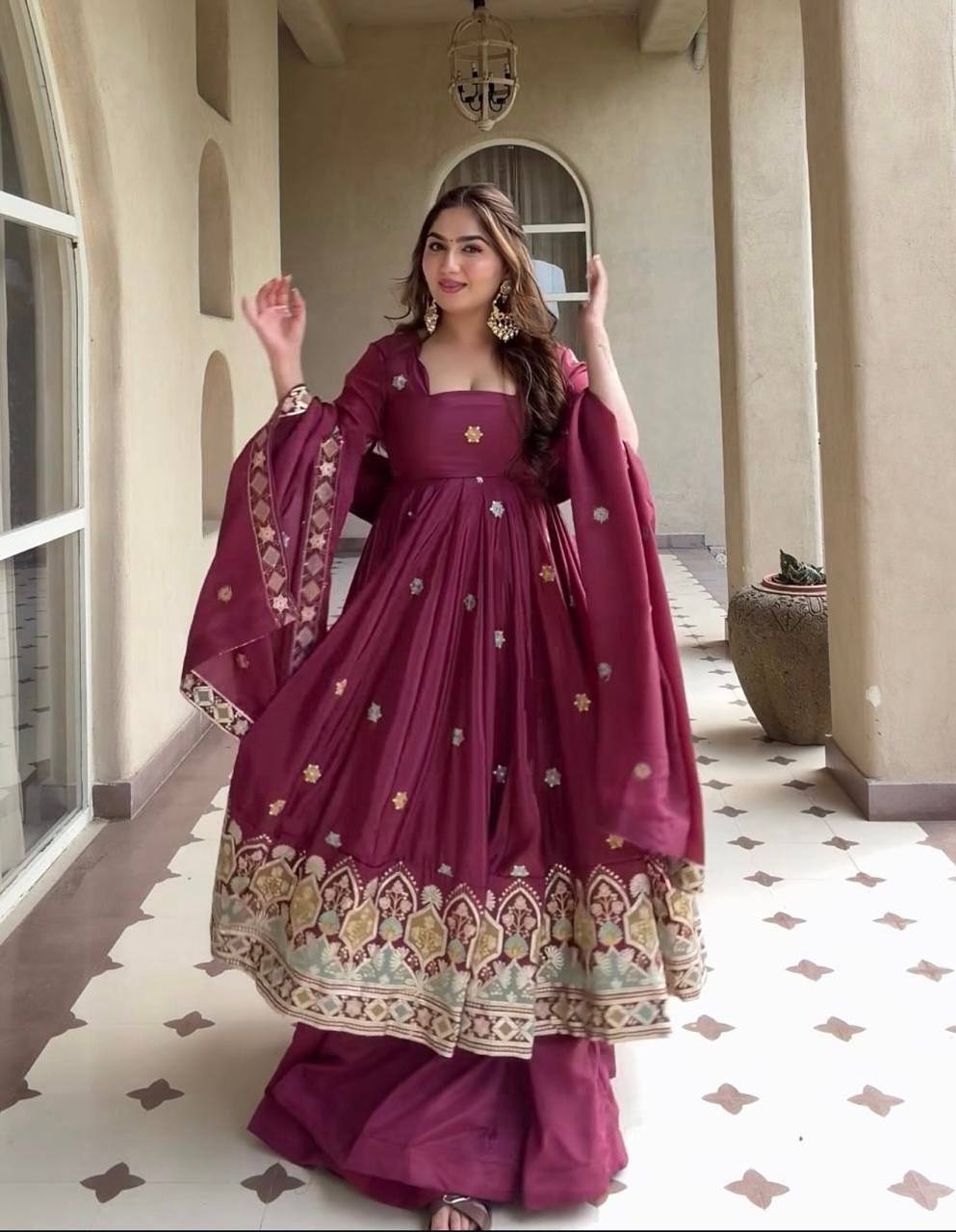 Graceful Presence in Maroon Attire