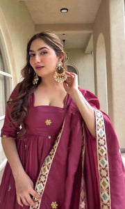 Graceful Presence in Maroon Attire