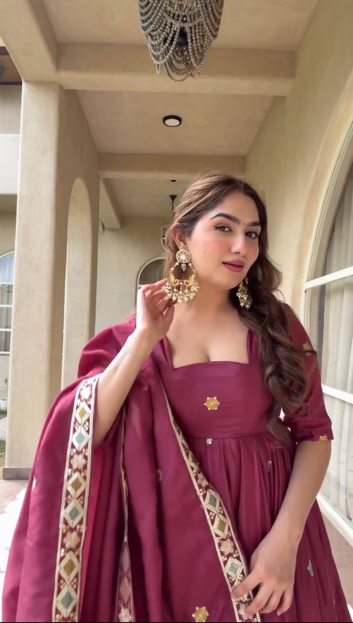 Graceful Presence in Maroon Attire