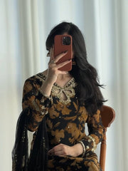 Glamorous Black and Gold Fashion Statement